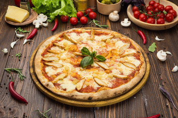 Pizza with chicken breast, pineapple and mozzarella cheese