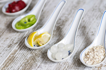 Porcelain spoons with doos ingredients