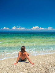 woman sunbathing on the beach