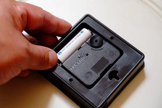 replacing the battery in a quartz wall clock