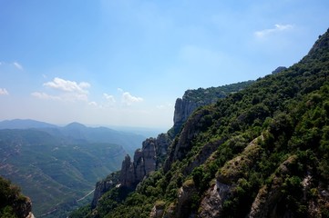 Fototapeta na wymiar A panorama to Mount Montserrat in the outskirts of Barcelona. Mountain range: Pyrenees.