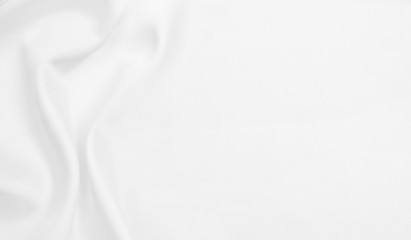 Smooth elegant white silk or satin luxury cloth texture as wedding background. Luxurious background design
