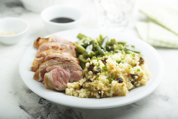 Veal fillet with green beans and couscous 
