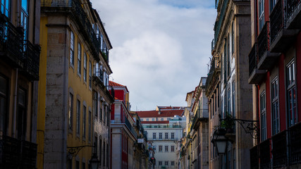 Fototapeta na wymiar Buildings in street in Lisbon