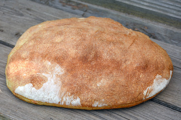 Bread on wooden background