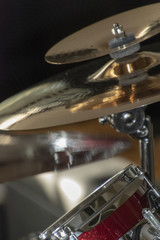 Fototapeta na wymiar Part of a drum set in close up. Crash cymbal, splash cymbal and drum.