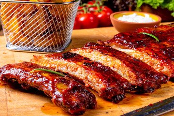 BBQ spare ribs from a charcoal grill - obrazy, fototapety, plakaty