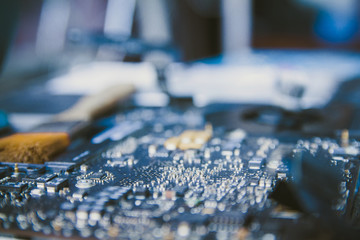 Electronic control panel, Repairs  laptop (pc, computer) and  motherboard. Installs the equipment (cpu) with brush.Instagram style filter photo vintage tone