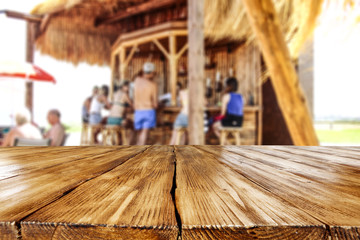 Summer photo of beach bar and desk of free space for your decoration.  - Powered by Adobe
