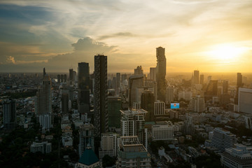 Modern building in Bangkok business district at Bangkok city with skyline during sunset, Thailand.