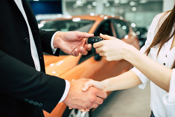 Perfect choice. Hand over a car keys in dealership