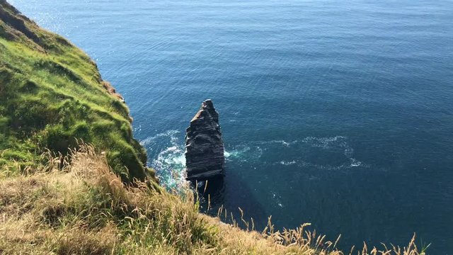 The famous Cliffs of Moher are sea cliffs located at the southwestern edge of the Burren region in County Clare, Ireland. They run for about 14 kilometres.