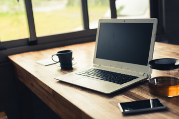 Obraz na płótnie Canvas laptop on wooden desk