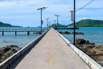 Obraz premium Concrete piers with staircase in the sea