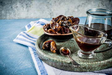 Date honey with dried dates, Jewish national sweet food, copy space