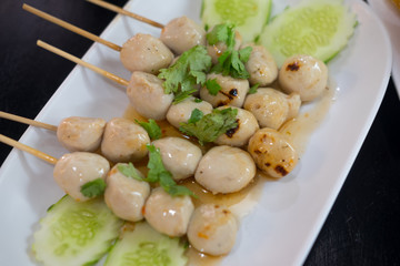 Grilled meatball with sauce