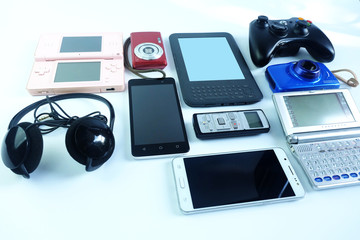 Damaged or old used electronics gadgets for daily use on white background, Reuse and Recycle concept
