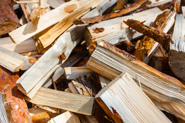 Firewood pile close-up. Woodpile macro. Natural energy resources