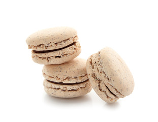 Tasty macarons on white background