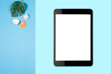 Digital tablet with blank screen on pastel color background, flat lay photo