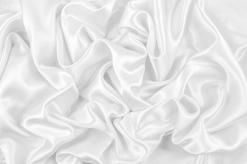 Obraz premium Luxurious of smooth white silk or satin fabric texture background