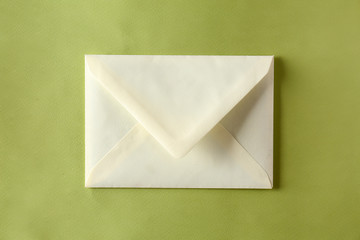 Mail envelope on color background