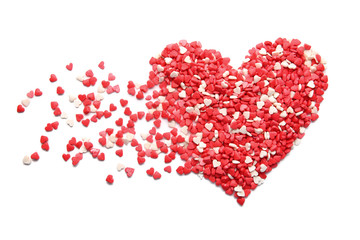 Composition with tasty heart-shaped candies on white background