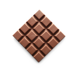 Tasty milk chocolate bar on white background