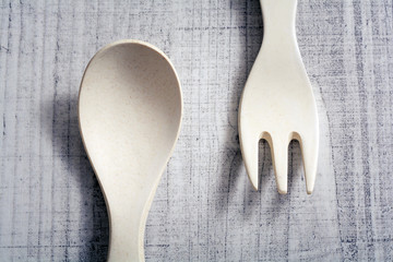 Set Of Bamboo Fork And Spoon In Children Size Lying Against Each Other, Learn To Use Cutlery As A...