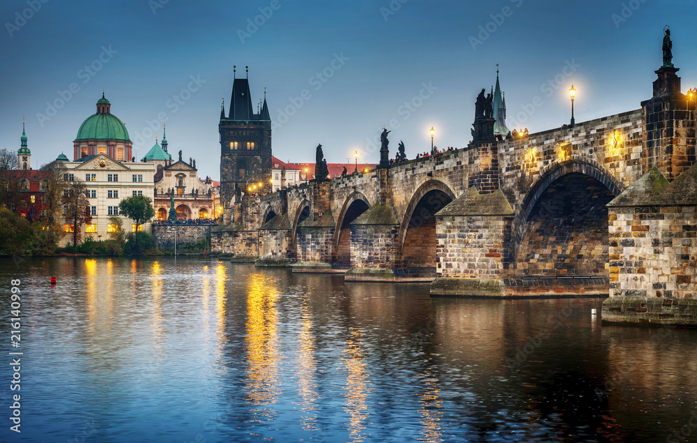 Wall mural it's evening in the city of prague. view of the charles bridge. czech republic.