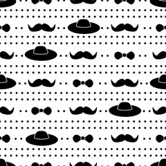 Seamless pattern with black mustache, bow tie and hat .