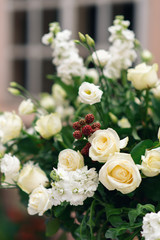 Beautiful flower decorations for the wedding ceremony. White roses