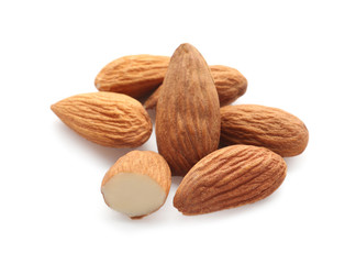 Tasty almonds on white background