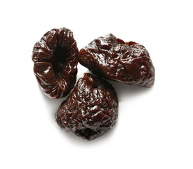 Prunes on white background