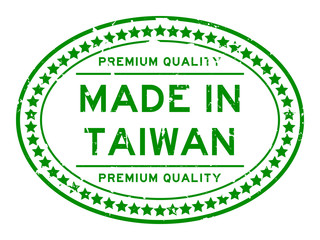 Grunge green premiumq quality made in Taiwan oval rubber seal business stamp on white background