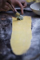 man making ravioli