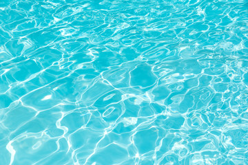 Blue water surface and ripple wave in pool