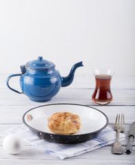 turkish borek boyoz with egg and tea