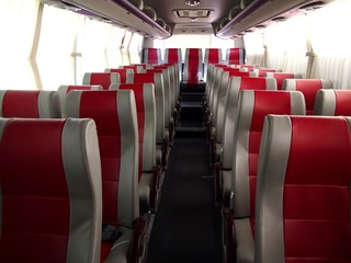 Fototapeta premium Empty seats inside a bus