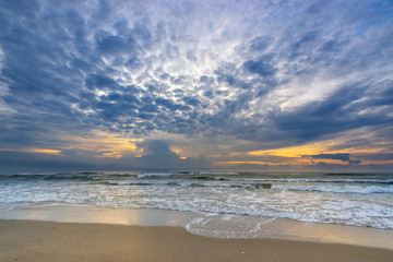 abstract cloudscape with wave on the beach