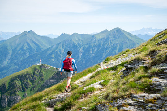 Woman Hiking On Mountain Path Above Gastein, Salzburg, Austria