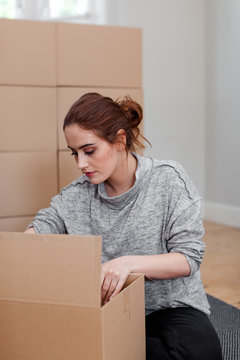 Woman with cardboard box packaging