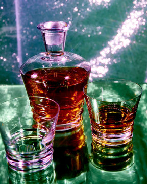 Close up view of decanter and tumblers