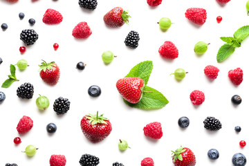 Obraz na płótnie Canvas Delicious ripe berries on white background, top view