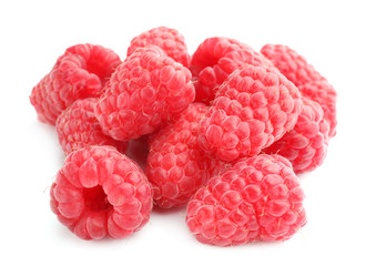Sweet ripe raspberries on white background