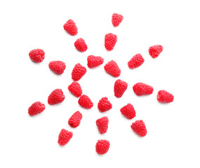 Composition with sweet ripe raspberries on white background