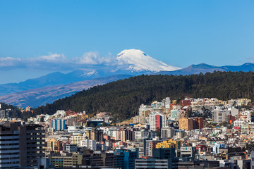 City of Quito with the Cayambe volcano