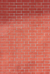 Brick Wall Bright Red Stone Texture Background with Sun Shades. Abstract Brick Stones Pattern, Colorful Rough Wall Front Background. Brick Wall Empty Outdoor Surface Close Up View with Copy Space.