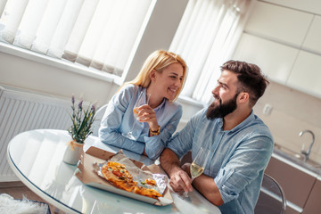 Young couple having great time at home