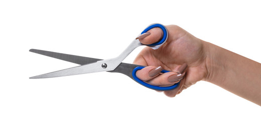 scissors in a female hand